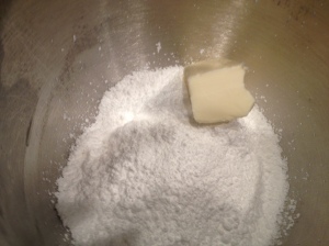 Mixing the powdered sugar with the butter..